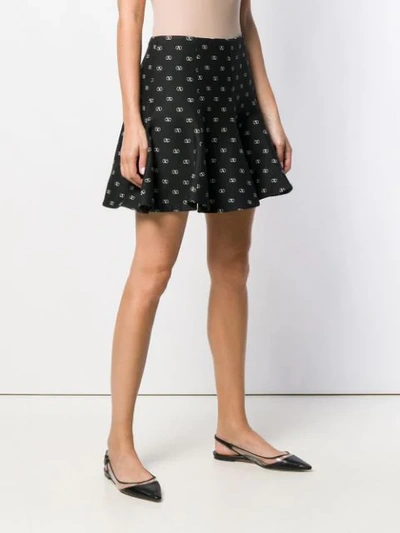 Shop Valentino Printed Vlogo Mini Skirt In 0na  Black