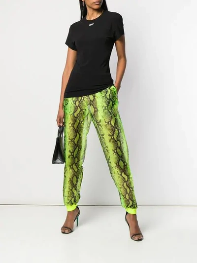 Shop Off-white Snake Print Track Trousers In Yellow