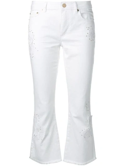 Shop Michael Michael Kors Studded Kick Flare Jeans In White