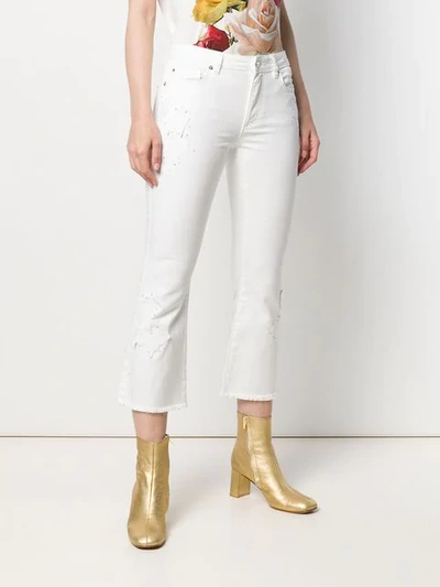 Shop Michael Michael Kors Studded Kick Flare Jeans In White