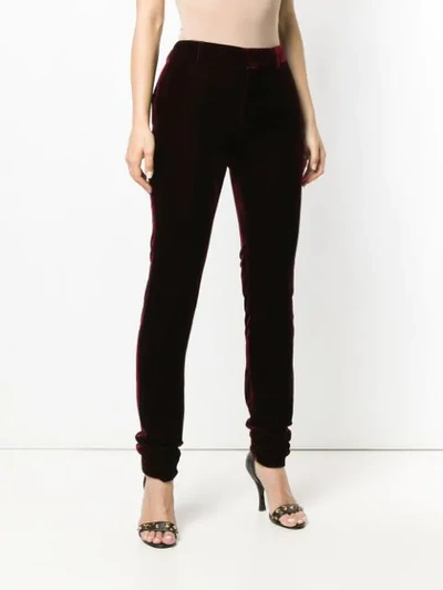 Shop Saint Laurent Slim-fit Trousers In Red