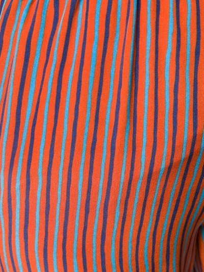 Shop Aspesi Striped Flare Trousers - Orange