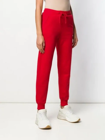 Shop Msgm Logo Sweat Pants In Red