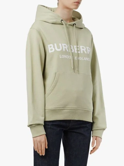 Shop Burberry Logo Print Cotton Hoodie In Pale Apple Green