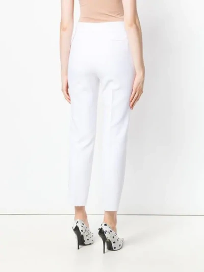 Shop Msgm Cropped Tailored Trousers In White