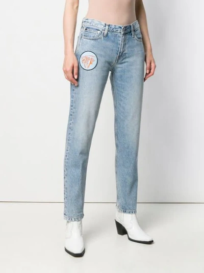 Shop Calvin Klein Multi-patches Boyfriend Jeans - Blue