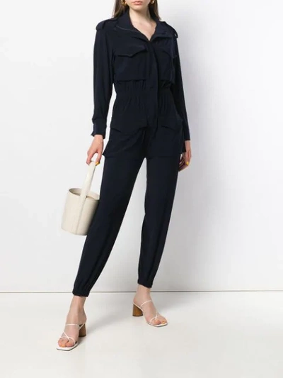 Shop Norma Kamali Long-sleeve Fitted Jumpsuit In Midnight