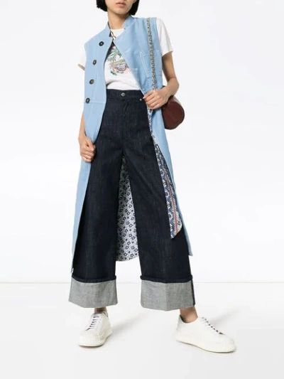 Shop Jw Anderson Turned-cuff Wide-leg Jeans In Blue