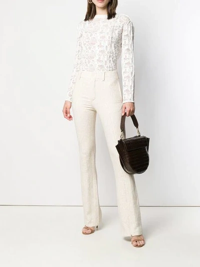 Shop Chloé Textured Flared Trousers In Neutrals