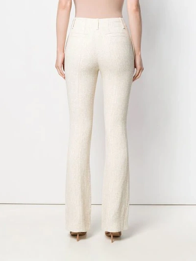 Shop Chloé Textured Flared Trousers In Neutrals