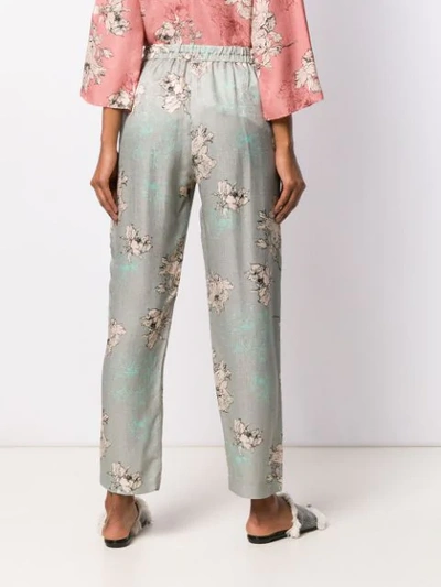 Shop Antonelli Floral Print Trousers In Green