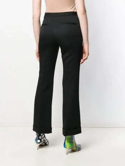 Shop Maison Margiela Flared Trousers In Black