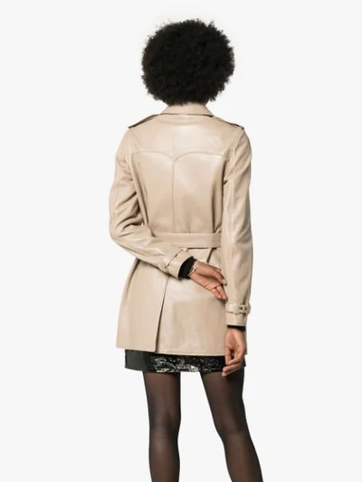 Shop Saint Laurent Double-breasted Leather Trench Coat In Neutrals