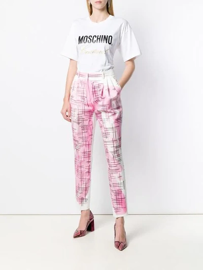 Shop Moschino Brushstroke-style Tailored Trousers In White