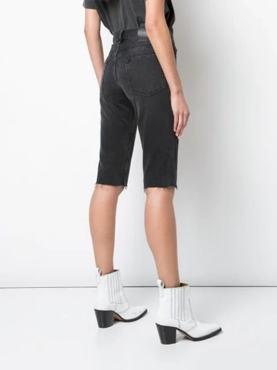 Shop Anine Bing Knee Length Denim Shorts In Black