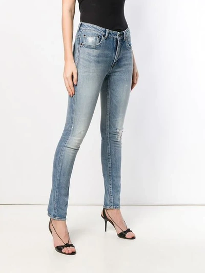 Shop Saint Laurent Distressed Skinny Jeans In Blue