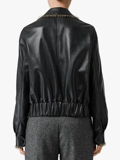 Shop Burberry Ring-pierced Lambskin Jacket In Black