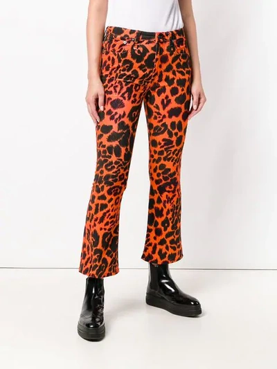 Shop R13 Flared Leopard Print Jeans In Yellow