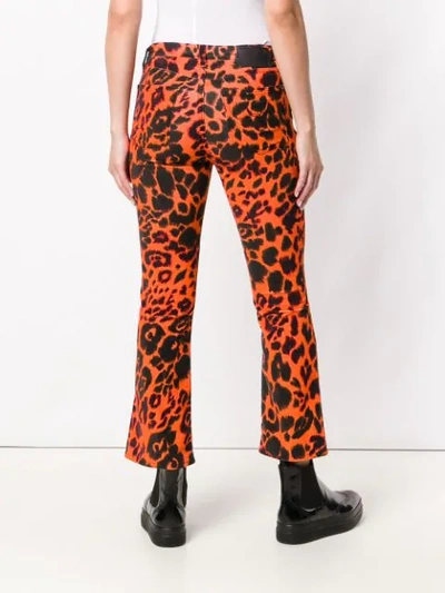 Shop R13 Flared Leopard Print Jeans In Yellow