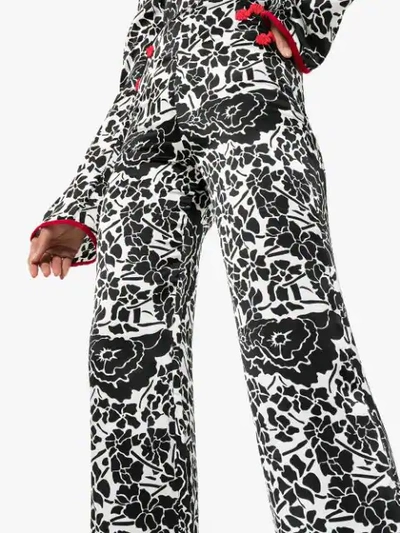 Shop De La Vali Una Printed Wide Leg Trousers In Black