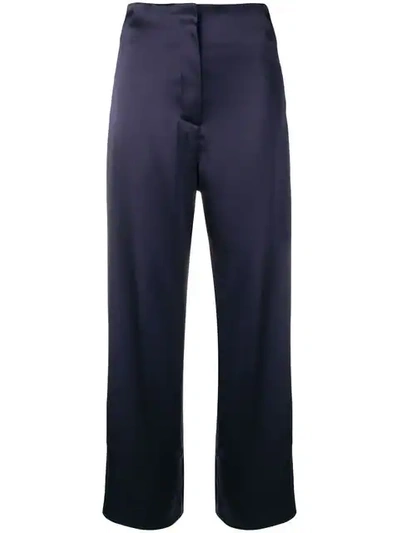 Shop Nanushka Caribe Satin Trousers In Blue