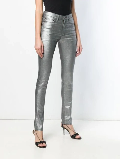 Shop Saint Laurent Metallic Skinny Jeans In Silver