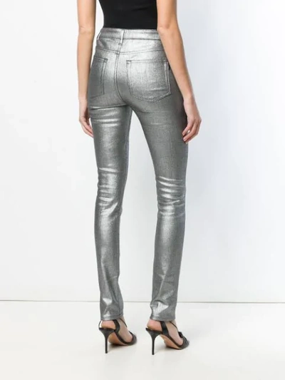 Shop Saint Laurent Metallic Skinny Jeans In Silver