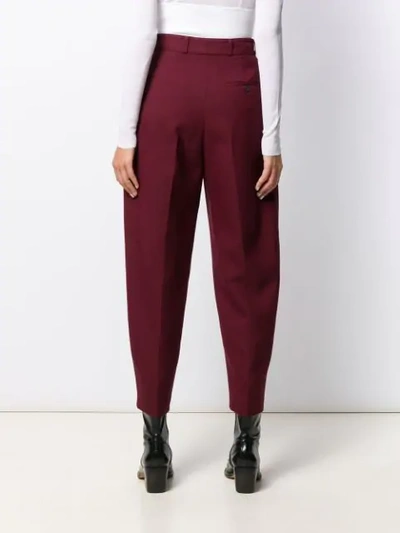 Shop Alexander Mcqueen High-waist Peg Trousers In Red