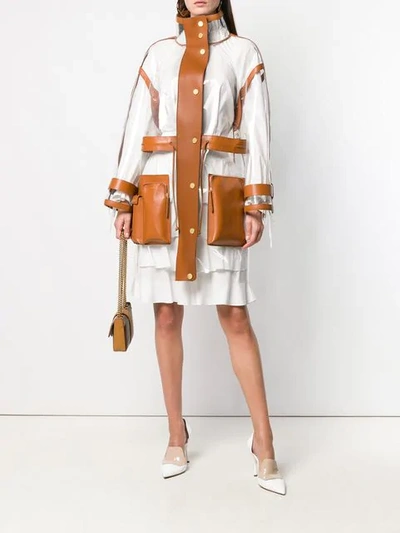 Shop Fendi Leather Trim See-through Raincoat In Brown