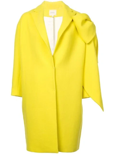 Shop Delpozo Bow-embellished Cocoon Coat In Yellow