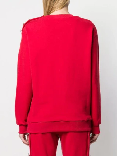 Shop Alexandre Vauthier Embellished Brooch Sweatshirt - Red