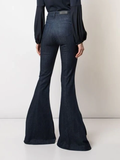 Shop Cushnie Flared High-waist Jeans - Blue