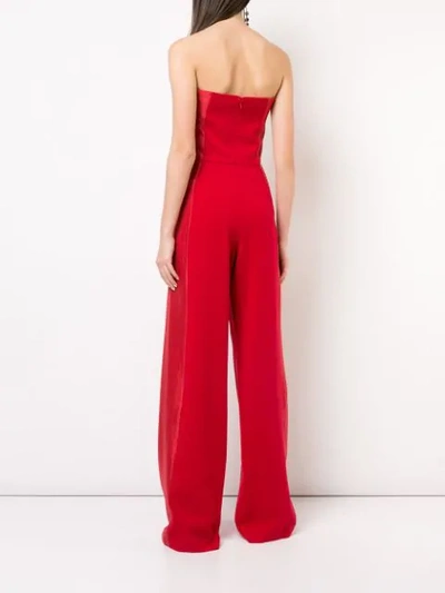 Shop Black Halo Strapless Flared Jumpsuit In Red