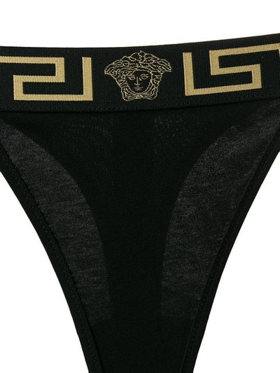 Shop Versace Grecca Waistband Thong In A1008