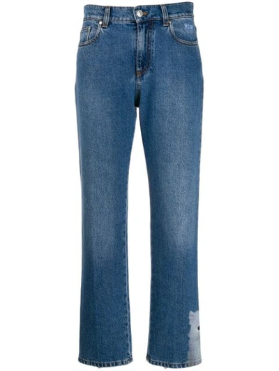 Shop Msgm Cropped Cat Hem Jeans In Blue