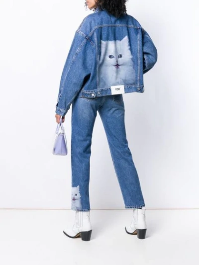 Shop Msgm Cropped Cat Hem Jeans In Blue