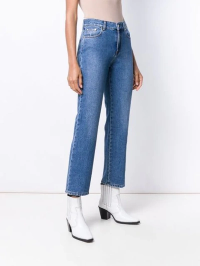 Shop Msgm Cropped Cat Hem Jeans In Blue