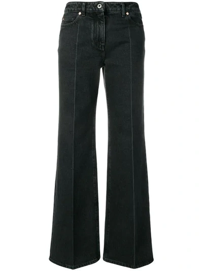 Shop Valentino Vlogo Flared Jeans In Black