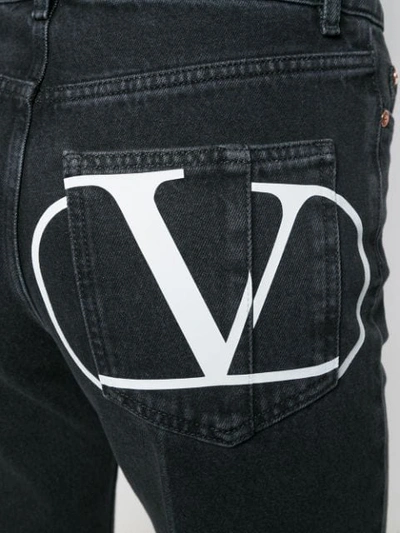 Shop Valentino Vlogo Flared Jeans In Black