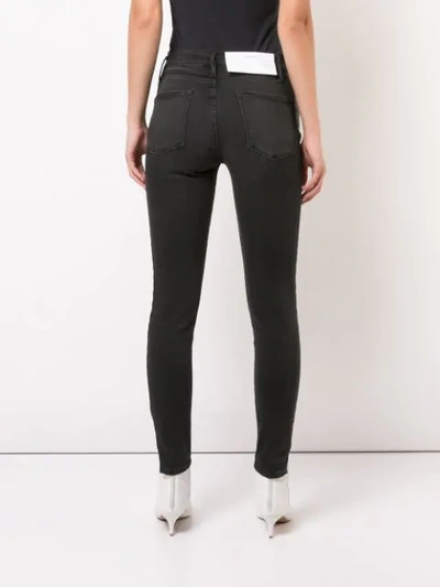 Shop Frame Side Stripe Skinny Jeans In Black