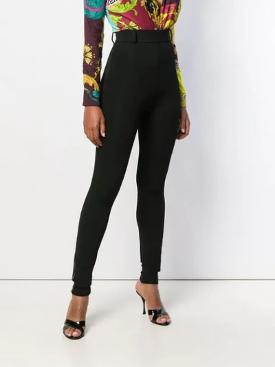 Shop Versace High-waist Skinny Trousers In Black