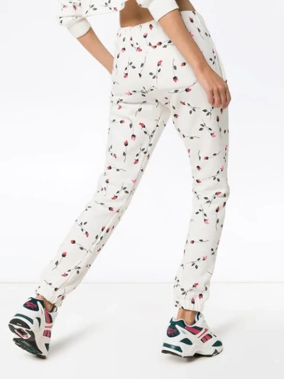 Shop Adam Selman Sport Rose Print Track Pants  In White