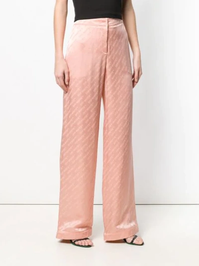 Shop Off-white Monogram Print Trousers In Neutrals