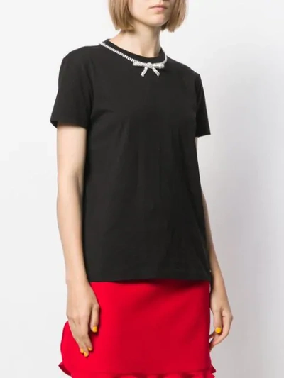 Shop Miu Miu Bow Embellished T-shirt In Black