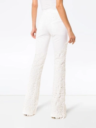 Shop Ronald Van Der Kemp Lace Appliqué Flared Jeans In White