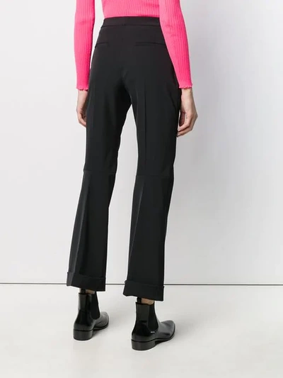 Shop Maison Margiela Kick Flare Trousers In Black