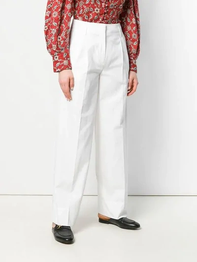 Shop Alberto Biani High-waisted Flare Trousers In White