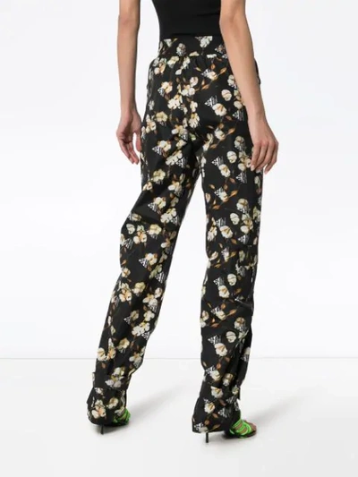 Shop Off-white Floral Design Jogger Pants "black"