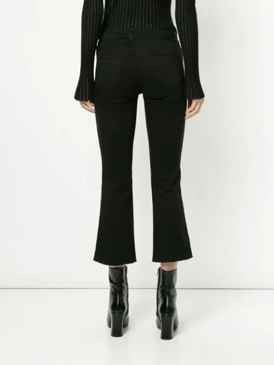 Shop J Brand Cropped Flare Jeans In Black