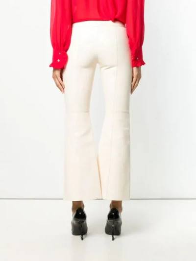 Shop Alexander Mcqueen Asymmetric Cropped Trousers In White